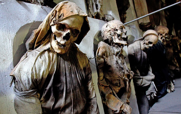 Fully clothed human remains are displayed at the Capuchin Catacombs in Palermo