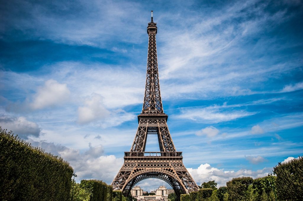 The beautiful view to Eiffel Tower under blue sky.