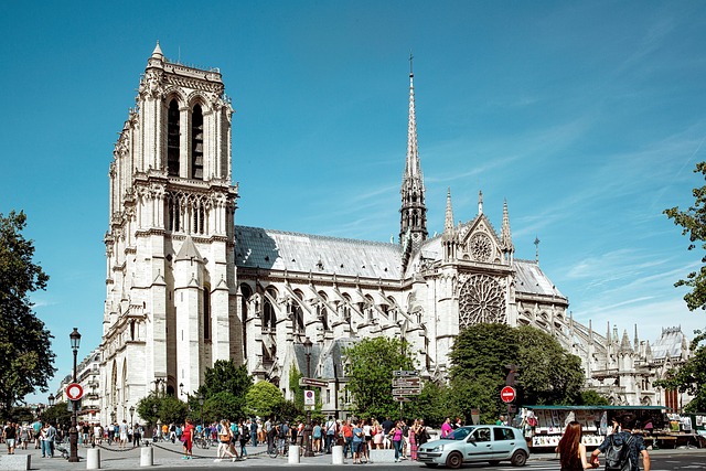 Notre Dame Cathedral facade with visitors.