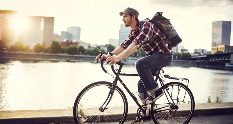 Cyclist by the Charles River in Boston.