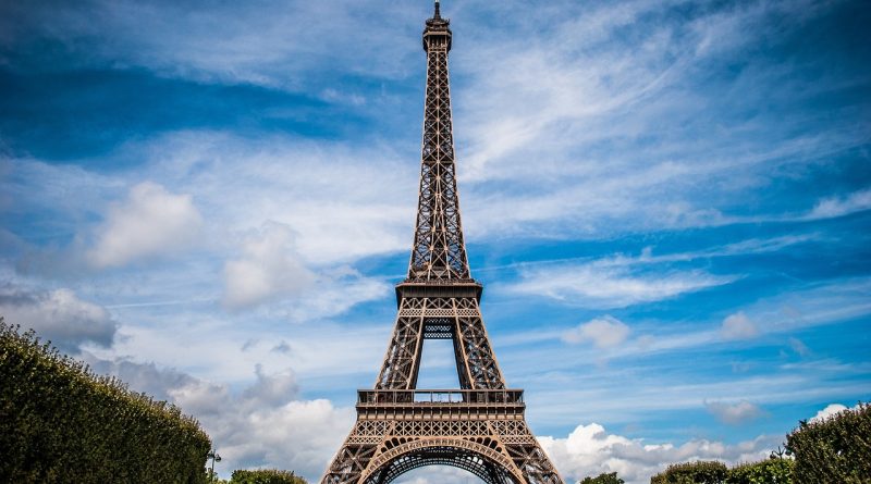 The beautiful view to Eiffel Tower under blue sky.