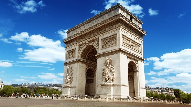 Arc de Triomphe against a blue sky, a stop on a Paris two-day tour.