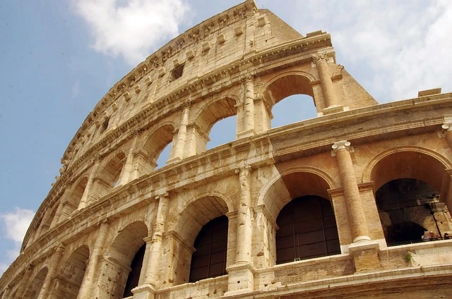 Colosseum in Rome against a clear sky.