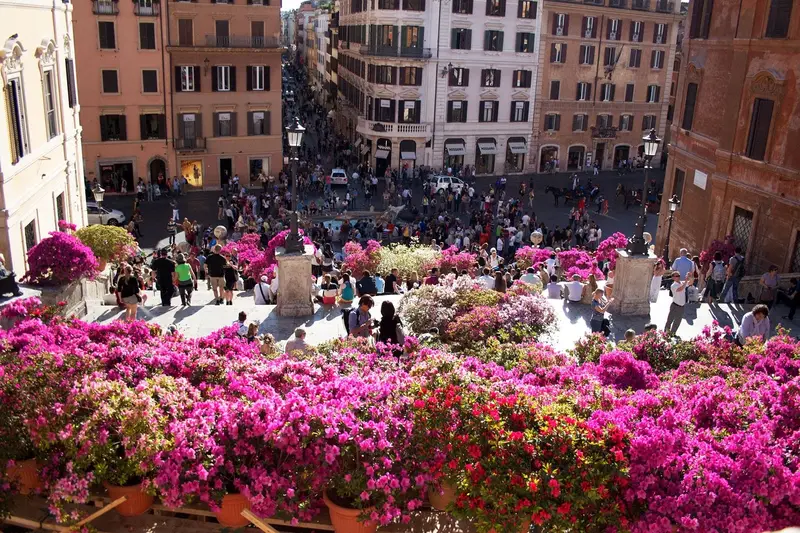 Flowers overlooking crowded Piazza di Spagna